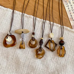 Handmade resin pendant necklaces with leather cords in retro New Chinese style