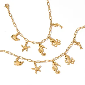 Gold-plated stainless steel necklace set with marine life charms like starfish and octopus.