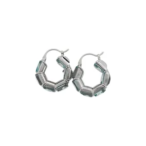 Eleganti orecchini a cerchio vintage in argento con zirconi blu e incisioni dettagliate