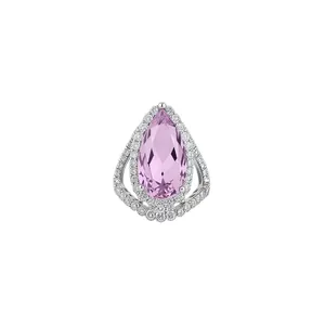 Luxury pear-shaped pink gemstone ring with full pavé diamonds on white background