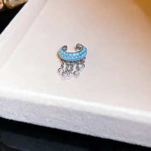 Elegant turquoise zircon ear cuff featuring dangling crystal charms for women