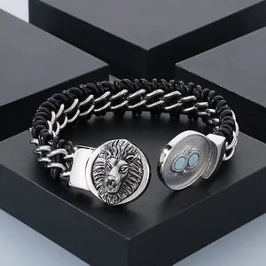 Detailed view of silver lion head bracelet with black braided leather and chain