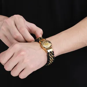 Macro detail of a golden lion head stainless steel woven leather bracelet for men