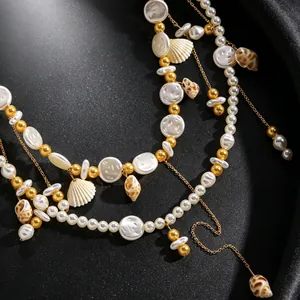 Exquisite detail of a multi-layer resort style waist chain with pearls and seashells