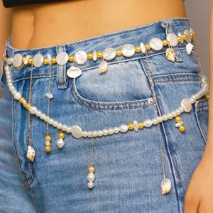 Detailed view of bohemian beach shell pearl waist chain featuring multi-layer tassel pendants