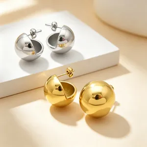 High-quality close-up showing gold and silver minimalist hollow sphere stud earrings for women
