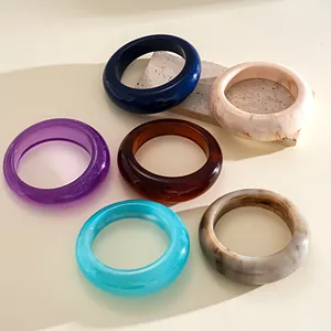 Collection of stylish vintage marbled resin circular bangles in multiple colors