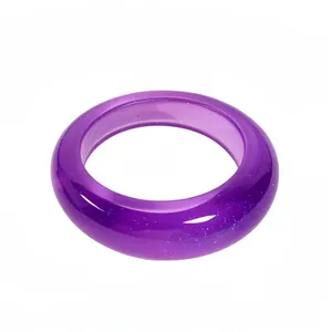 Minimalist purple translucent resin bangle with fine glitter details on white background.