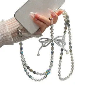 Elegante correa para móvil con perlas y lazo de cuentas iridiscentes accesorio de lujo
