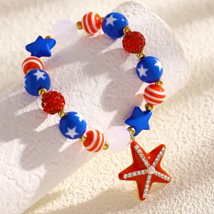 Close-up of American Independence Day beaded bracelet with red starfish pendant
