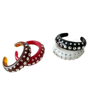 Punk style resin open cuff bangles with double-row silver rivets in amber, red, black, white