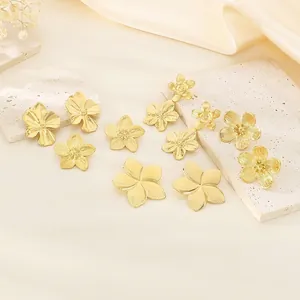 Elegant collection of textured 18K gold-plated stainless steel floral stud earrings