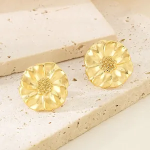 Elegantly textured golden petal flower earrings crafted from durable stainless steel.