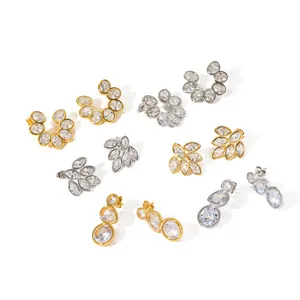 Elegante Edelstahlohrringe mit funkelndem Zirkonia im Blatt- und C-Form-Design.