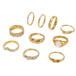 9-piece 18K gold plated stainless steel ring set with shell inlay and rhinestones