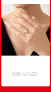 Elegant 925 sterling silver ring with a large oval moissanite stone worn on hand.