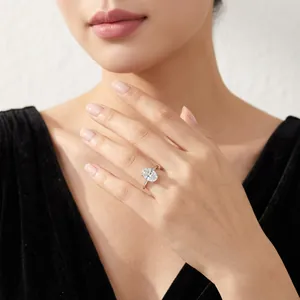 Elegant 925 sterling silver ring featuring a large oval sparkling stone worn by a model