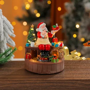 Hand-painted Santa Claus resin music box with rotating train and LED lights