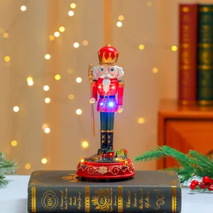 Festive Christmas Nutcracker music box featuring a rotating train and glowing LED lights