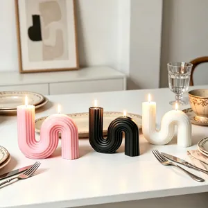 Modern S-shaped wavy geometric scented candles in pink black white for minimalist home decor