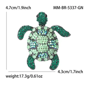 Detailed view of a green rhinestone turtle brooch with full size and weight specs.