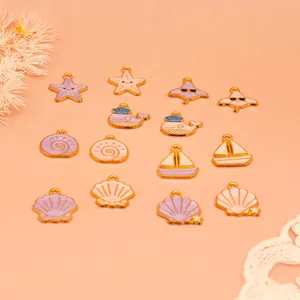 Detailed view of assorted ocean-themed alloy enamel charms for DIY jewelry making