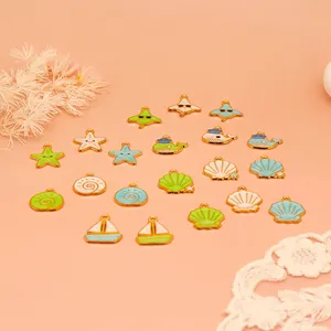 Various ocean-themed enamel alloy charms including shells and starfish for DIY jewelry