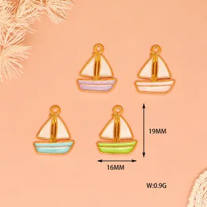 Detailed view of colorful sailing boat enamel charms with dimensions for DIY jewelry making