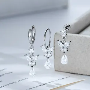 Elegantes pendientes de mariposa con circonitas de gota en aleación de titanio para mujeres