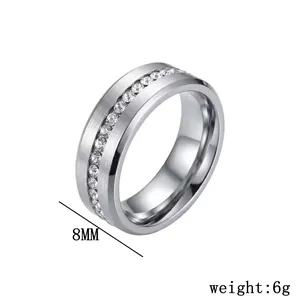 Detailed close-up of 8mm stainless steel ring with a single row of clear crystals