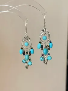 Vintage etnische zilveren hanger oorbellen met turquoise kralen en bladhangertjes