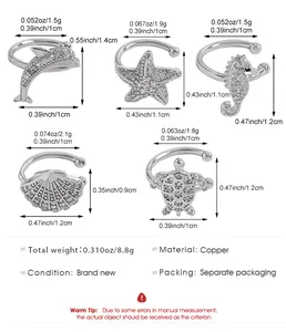 Detailed size and weight specifications for marine zircon ear cuffs: turtle and starfish.