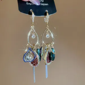 Exquise vintage etnische stijl waterdruppel kwastje oorbellen met kleurrijke bedeltjes