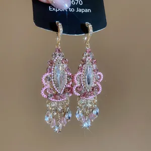 Vintage style pink crystal drop earrings with elegant teardrop beaded tassel fringe