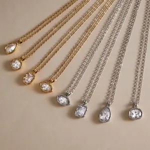 Detail of ribbed edge necklaces with various zircon cuts in gold and silver finishes