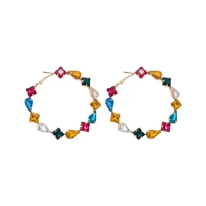 Elegant gold-tone hoop earrings decorated with colorful multi-shape rhinestones for women