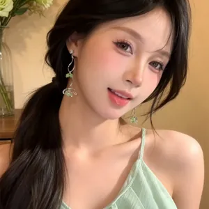 Elegant zircon flower tassel earrings shown on model for a sweet resort style look