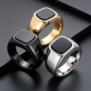 Men's stainless steel signet rings with square black onyx in gold, silver, and black finishes.