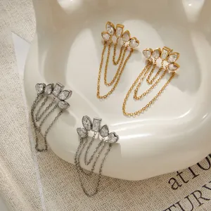 Detailed view of luxury zirconia tassel earrings in stainless steel and gold finish
