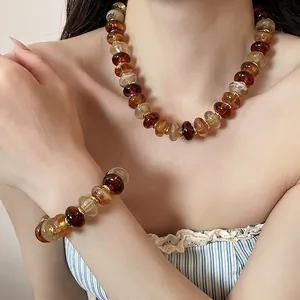 Ensemble collier et bracelet en perles acryliques style Maillard couleur ambre