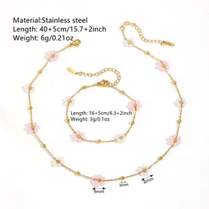 Close-up detail of stainless steel flower necklace set with dimensions and weight data