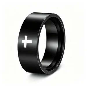 Detailed macro shot of a black stainless steel punk ring featuring a white cross emblem design