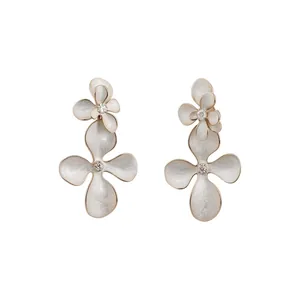 Elegant white enamel flower stud earrings with sparkling crystal centers for women