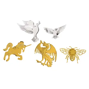Detailed view of various metallic animal-shaped pins including dragon, bee and unicorn