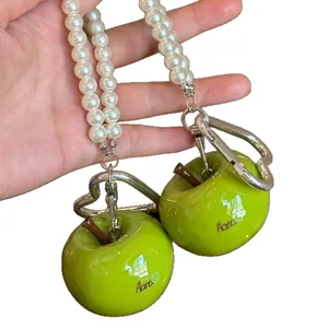 Leuke hars groene appel en kunstparel kralen sleutelhanger voor telefoons en tassen