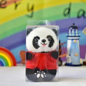 Adorable panda plush toy keychain wearing a red shirt inside a clear plastic gift display box