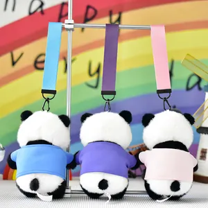 Detailed back view of cute dressed panda plush keychains in blue, purple, and pink