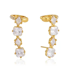 Gold-tone stainless steel ear cuff stud earrings featuring geometric cubic zirconia