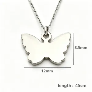Detail view of mirror-polished butterfly pendant with 12mm width and 8.5mm height