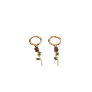 Elegant stainless steel tulip hoop earrings with green leaf and brown flower charms